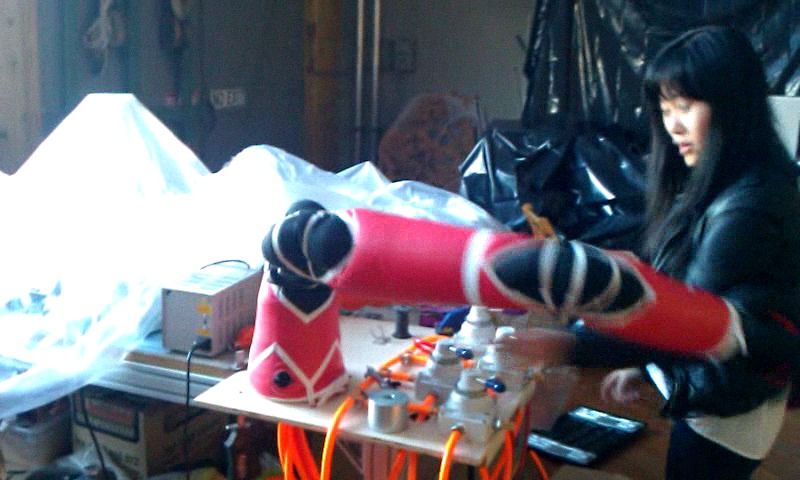 Wife sucker punched by inflatable robot arm