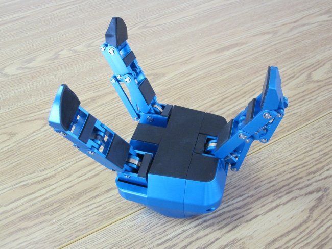 Robotiq robot hand called "Adaptive Gripper" with under-actuated fingers Robotiq robot hand called "Adaptive Gripper" with under-actuated fingers